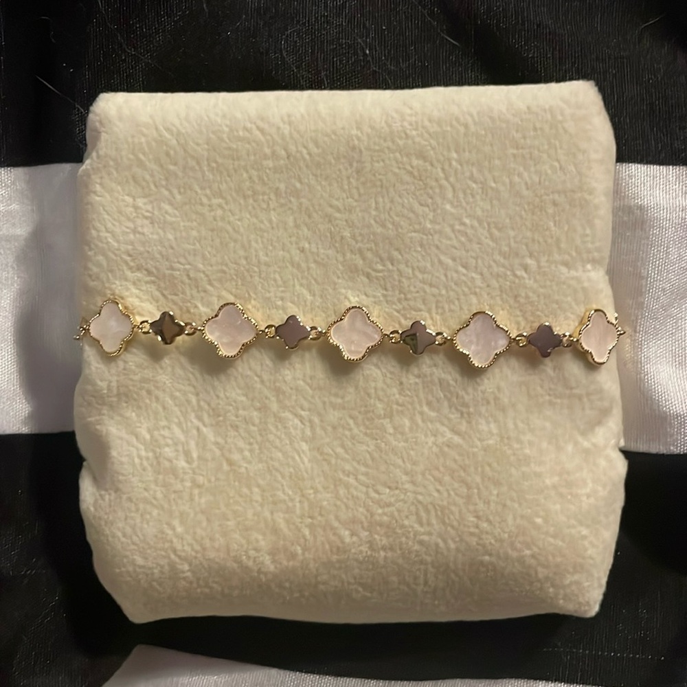 Pretty gold and light pink bracelet